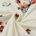 Гладкая матовая ткань из джерси из полиэстера и спандекса с цветком